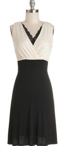 Cream/black dress with lace vneck